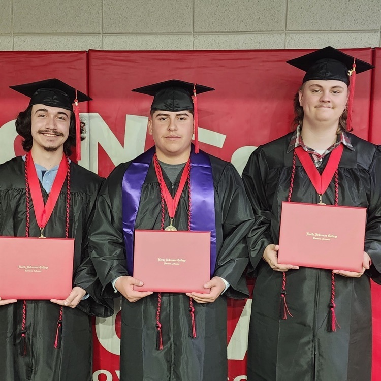 students with diplomas  